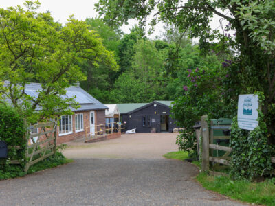 Entrance to site, Kenyon Bungalow on the left